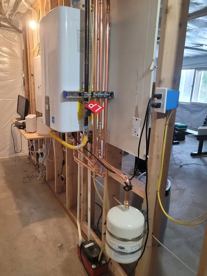 Licensed plumber repairing a kitchen sink in Richfield